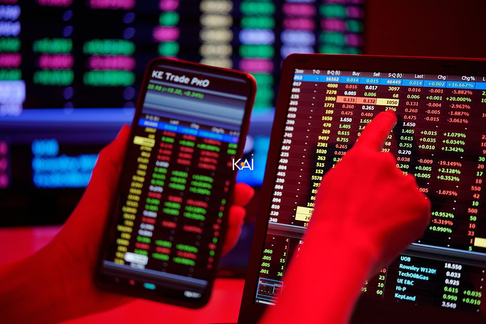 Professional stock market investors analyzing financial data across multiple computer screens, showcasing data-driven investment strategies.
